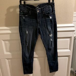 Express medium wash, distressed skinny jeans. Size 8S